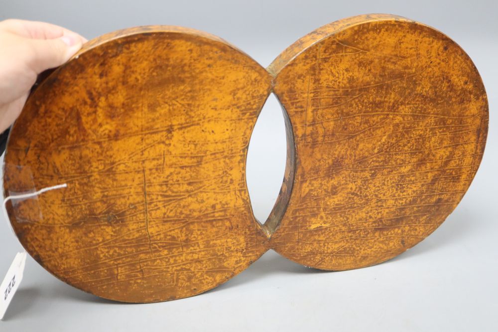 A 19th/20th century Chinese double circular wood and lacquer tray, length 42cm